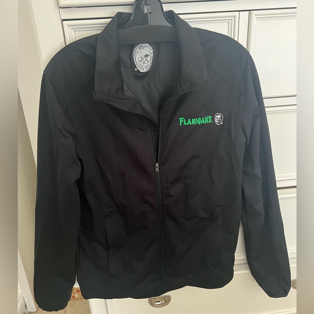 Flanigans logo Port Authority Black Jacket
